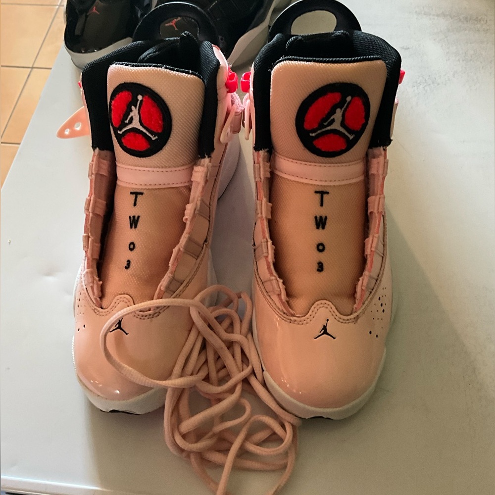 Jordan tennis shoes size 4y for big kids, pink.